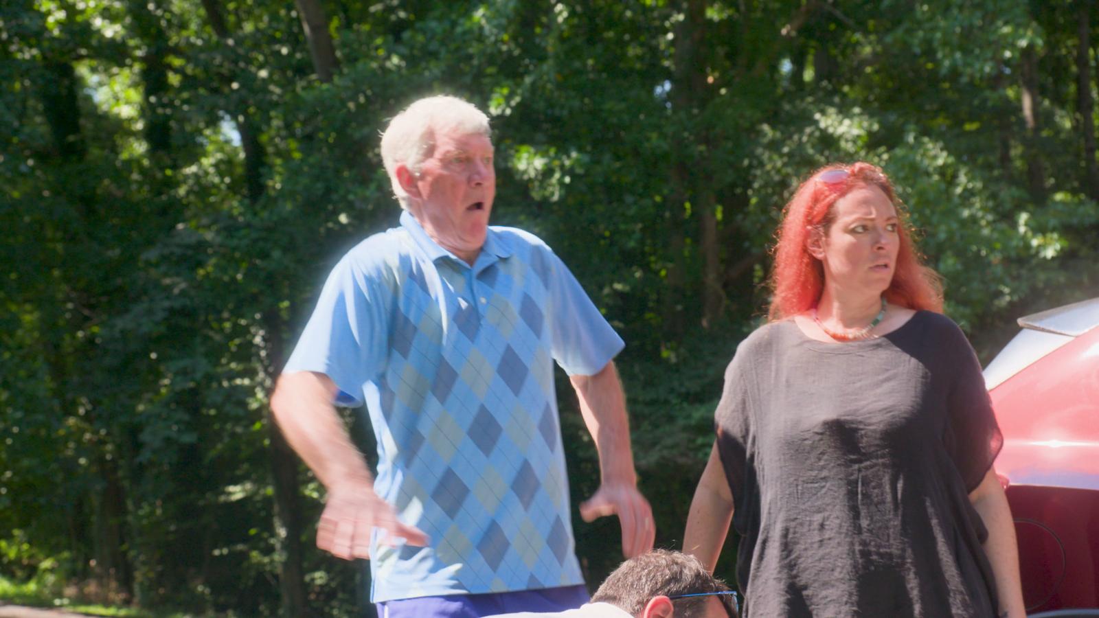 Wayne mid-escape as Joanne watches
